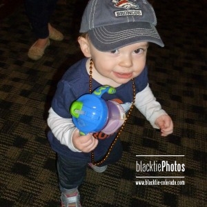With her Denver Broncos hat on and sippy cup in hand, Isabel is ready to cheer on the Broncos.