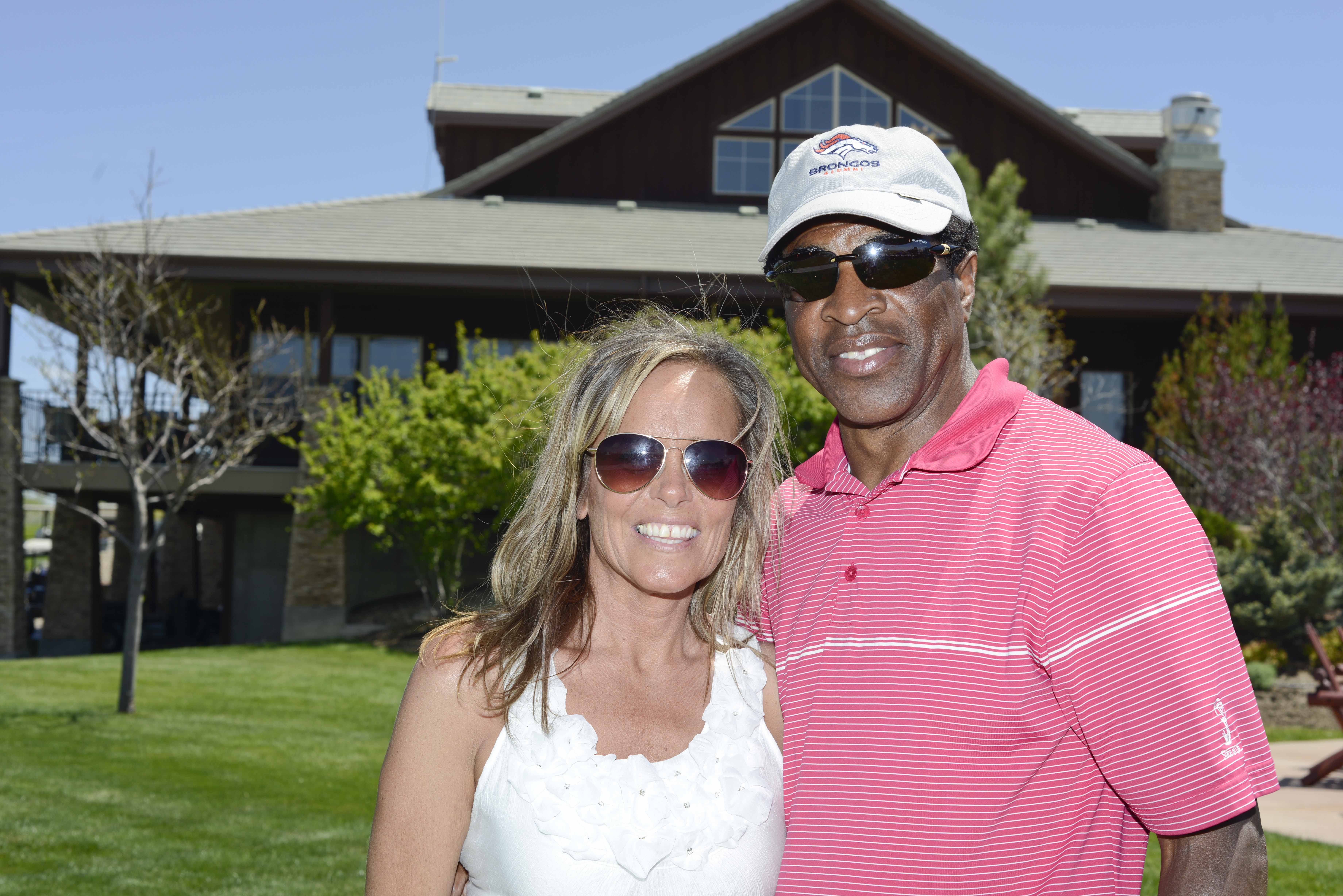 VP of Development Teri Smith and former Bronco Larry Brunson