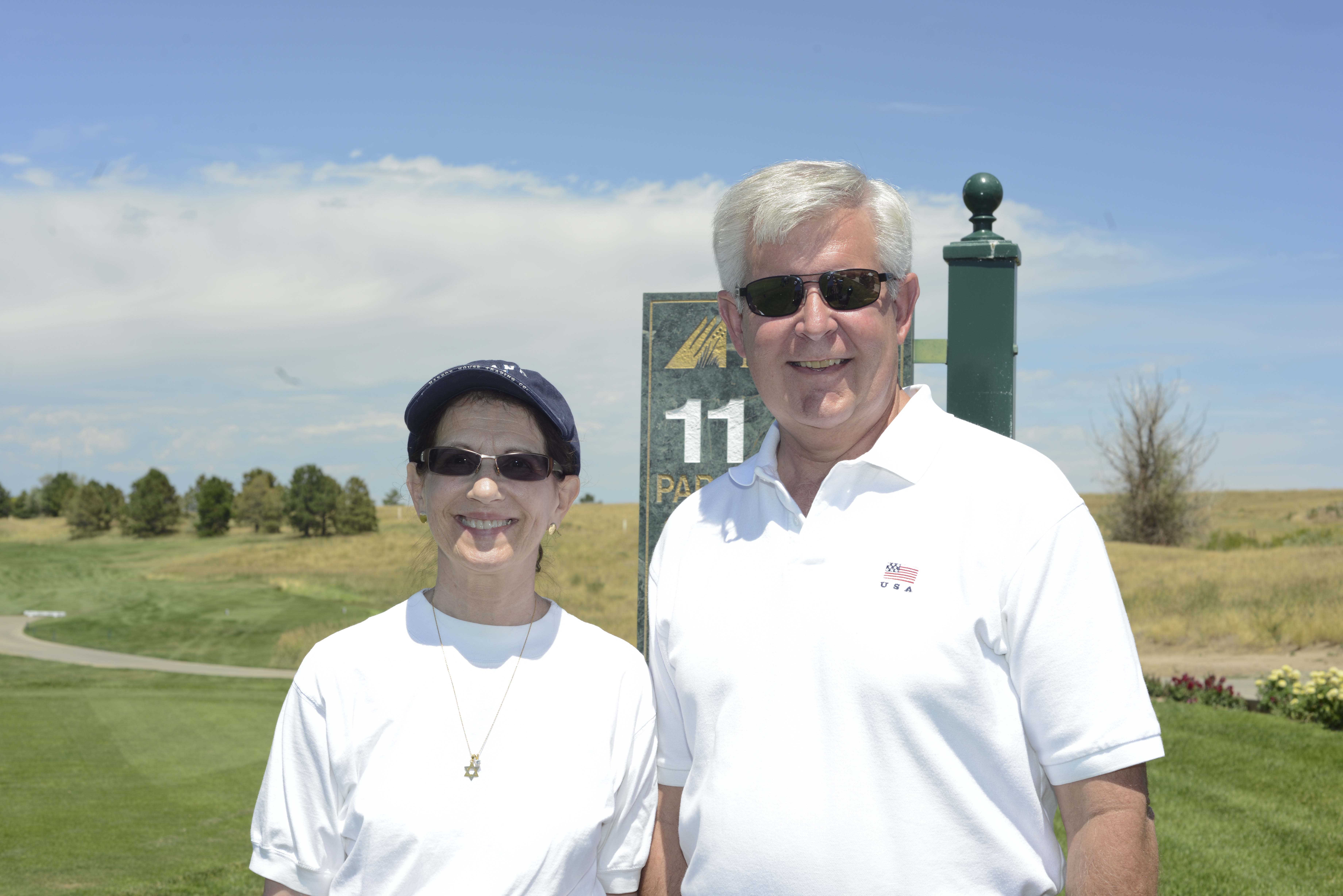 Volunteers at hole 11 Bob Leland and his wife Ruth