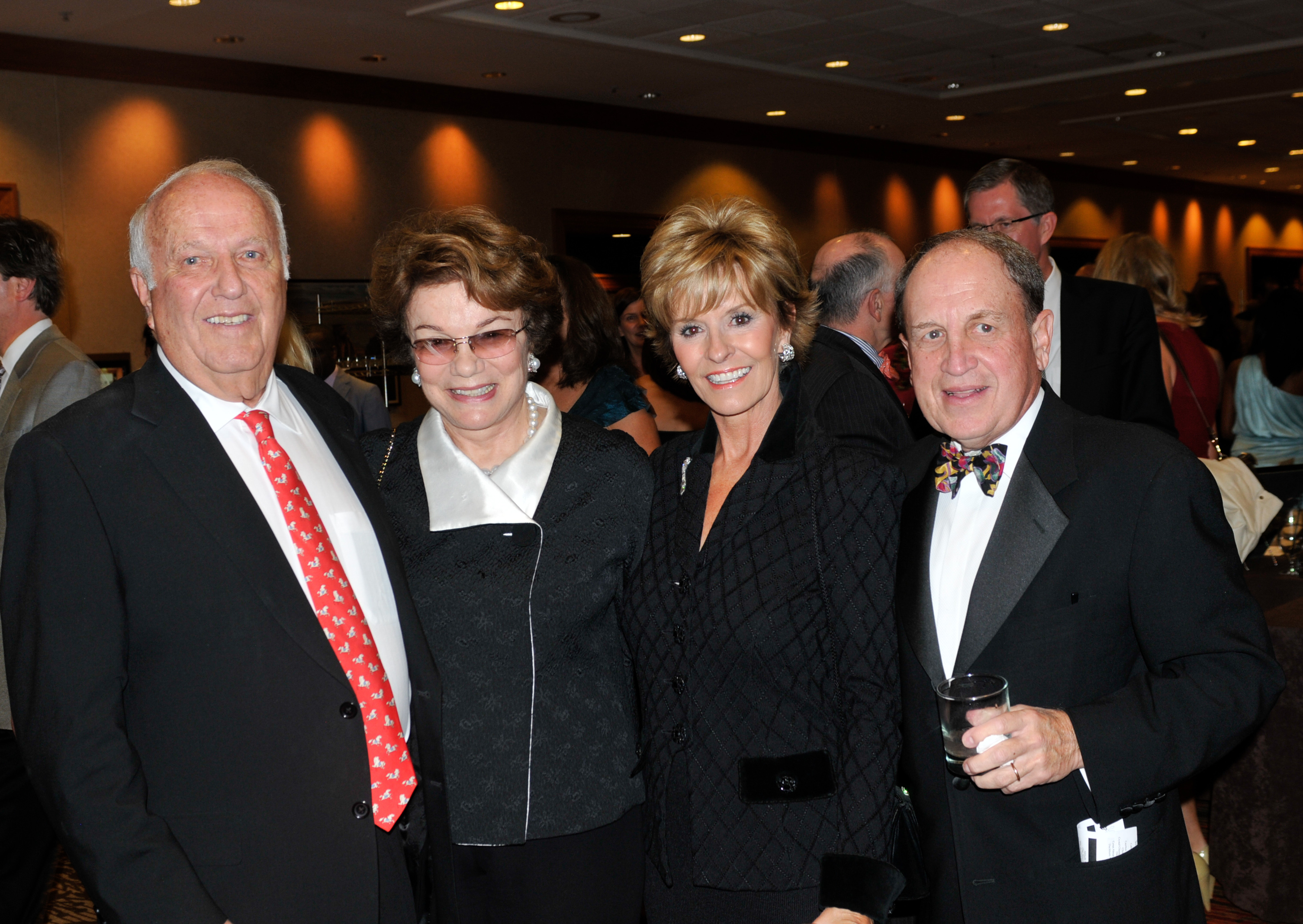 Dick and Marcia Robinson, left, with Jamie and Al Angelich