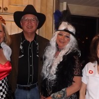 38. HYM’s Frances Owens, Jay & Kristina Davidson, & Glory Weisberg – Quinn Washington in the background at Denise Snyder’s fun Halloween party