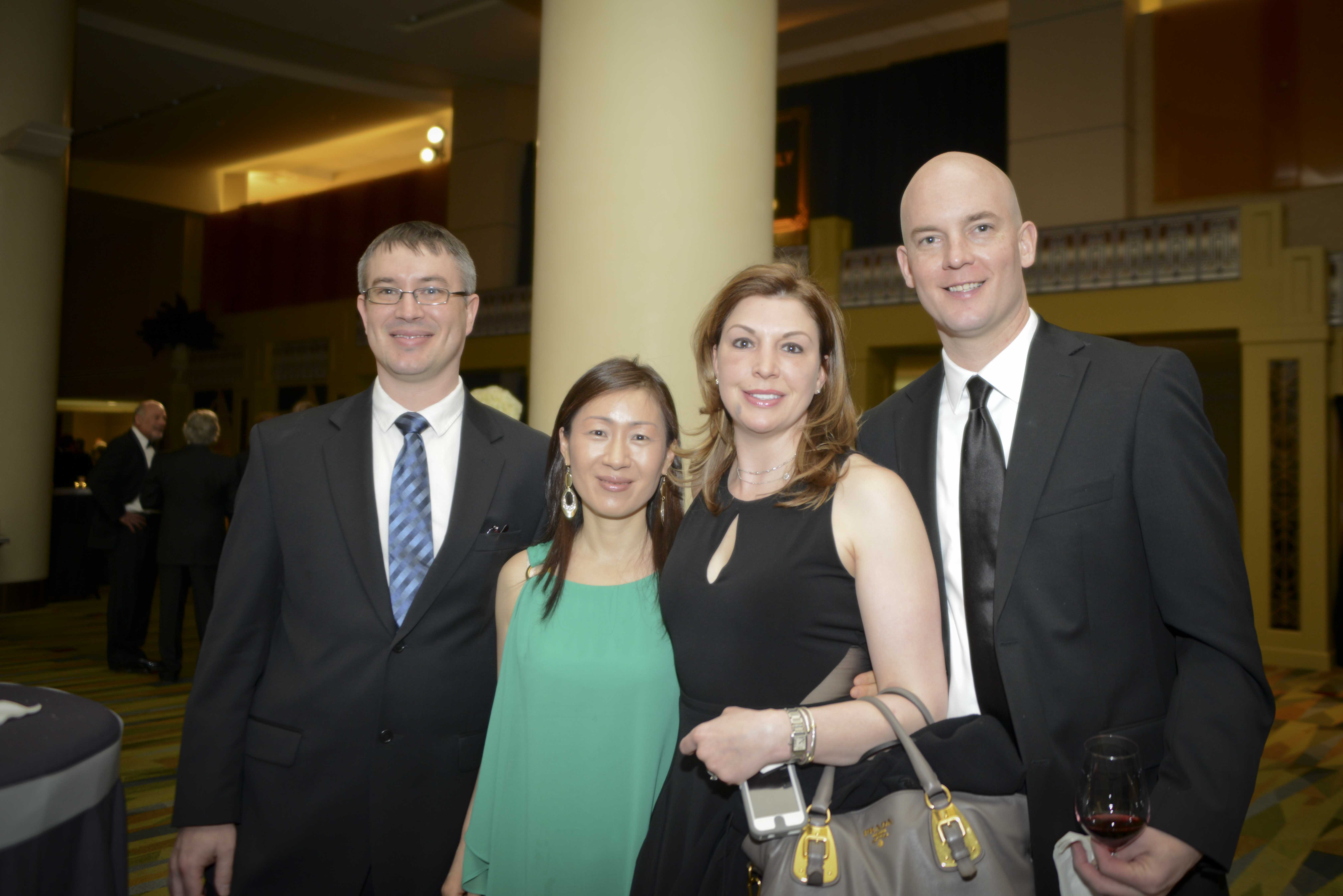 Liam and Jamie Schneider, left, with Jeff and Ashley Elder