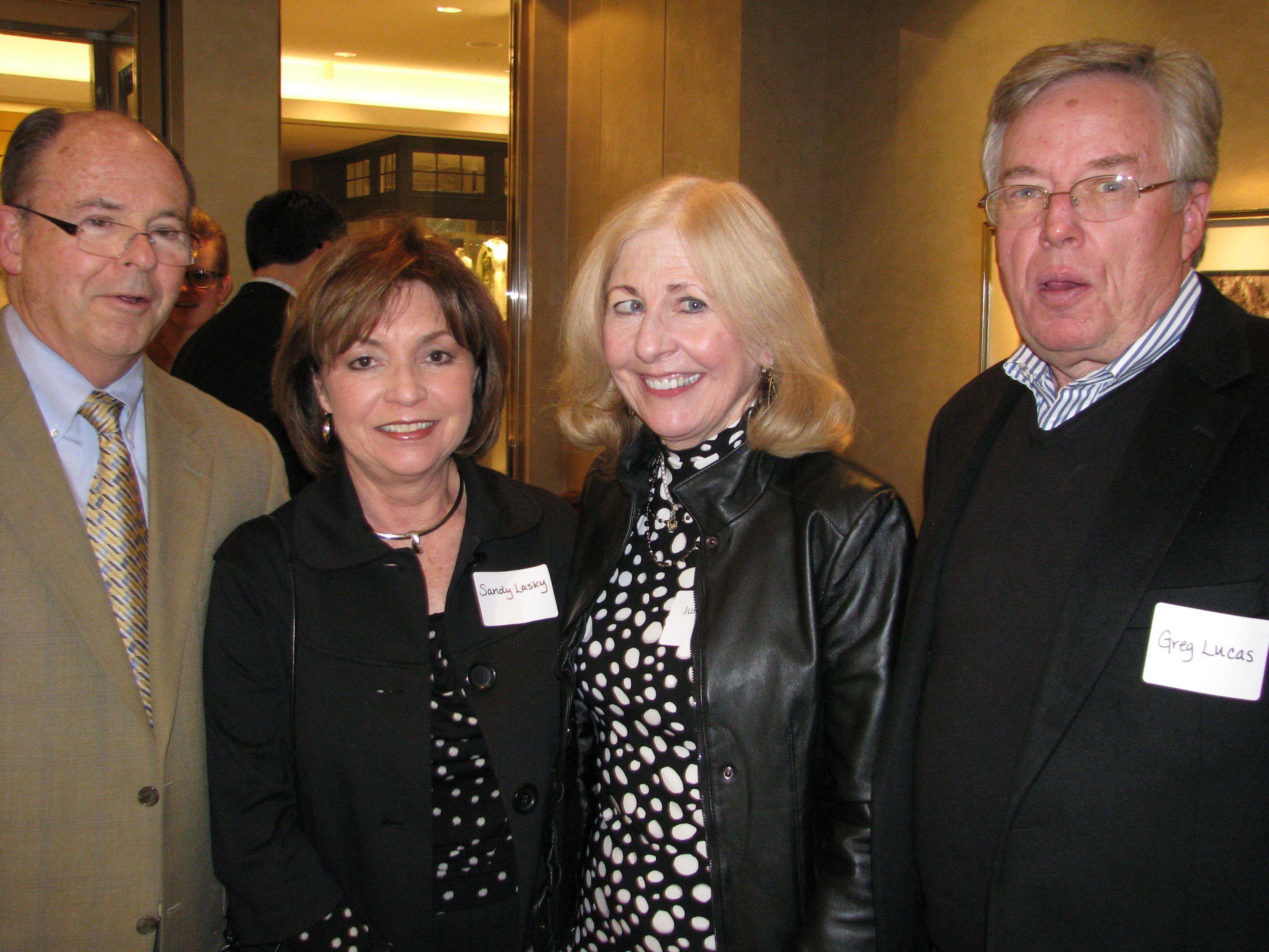 Evan Lasky smiles with Sandy Lasky, Julie Lucas and Greg Lucas