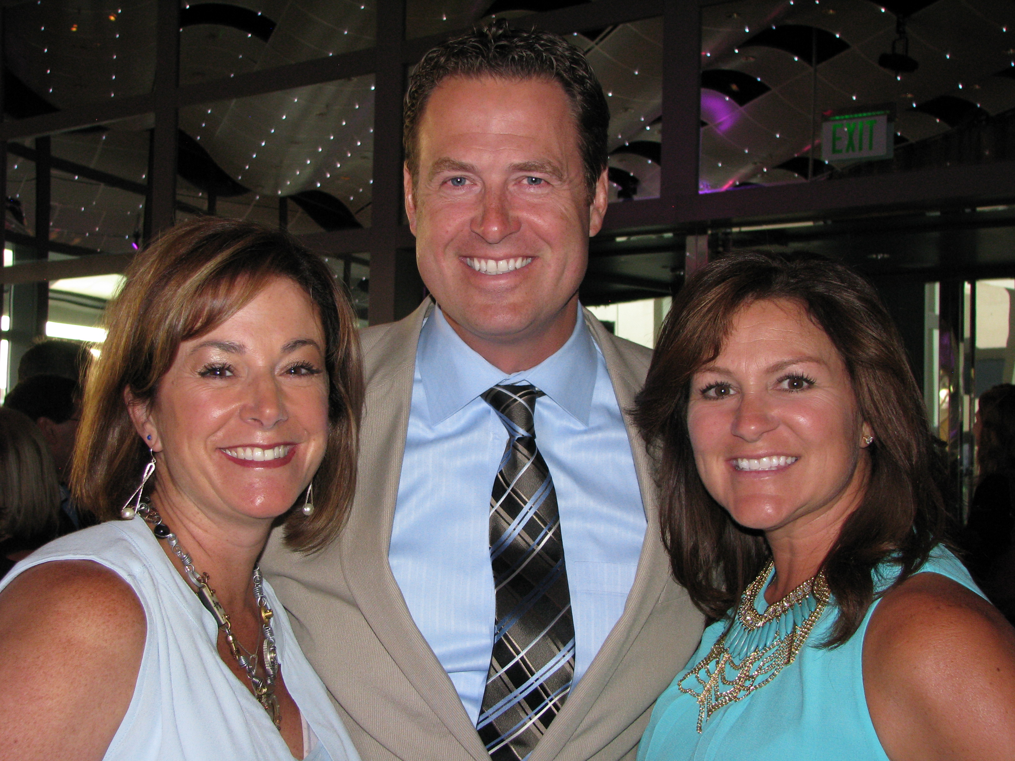 Big smiles from Amy Chase, left, Jim and Jodi Smallwood