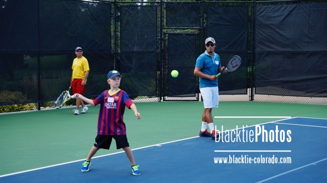 Teaching kids tennis "The Lifetime Sport" (Photo by Erik