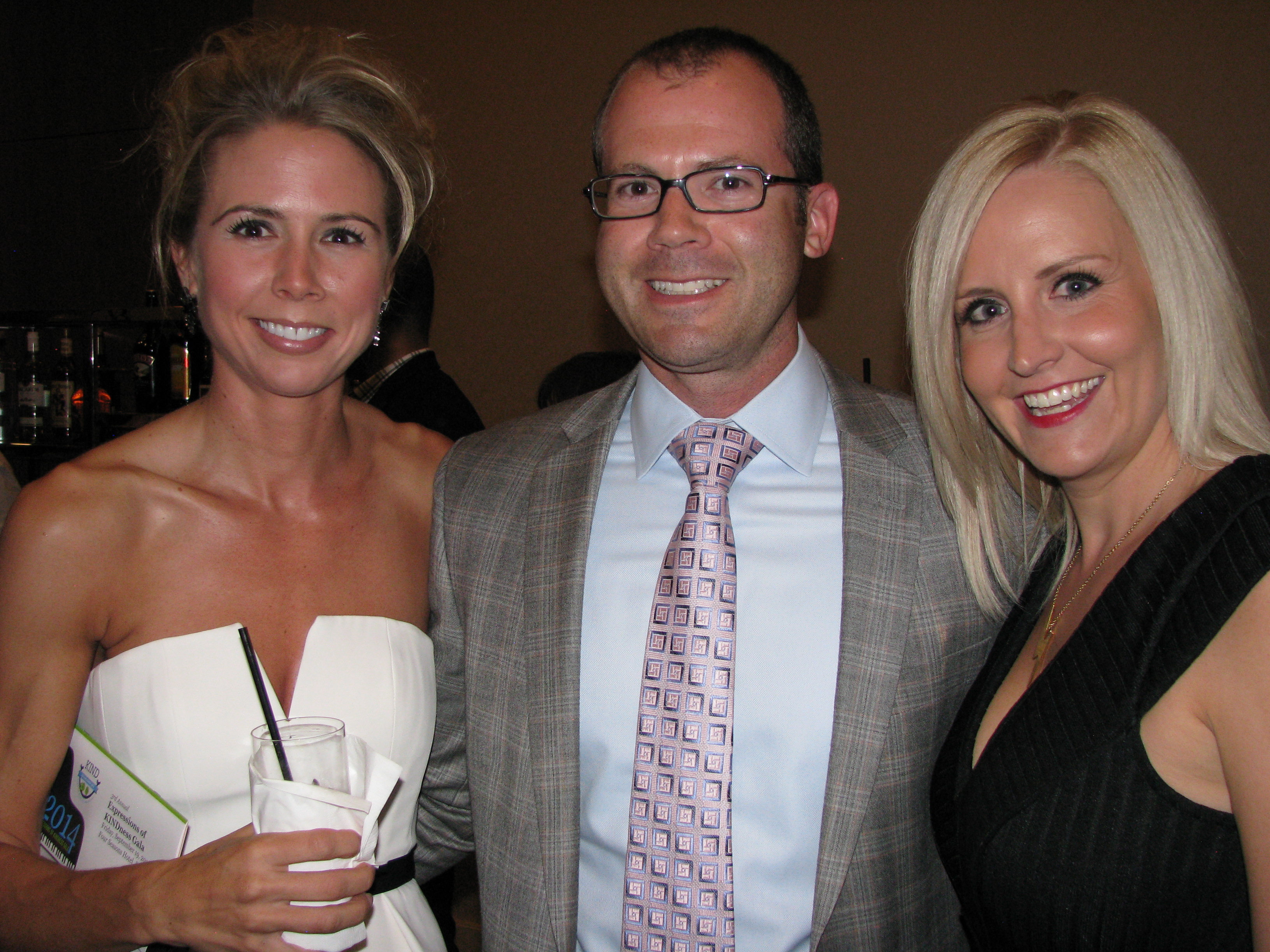 Carol Moreman, left, take a moment for a photo with Evan Miller and ...