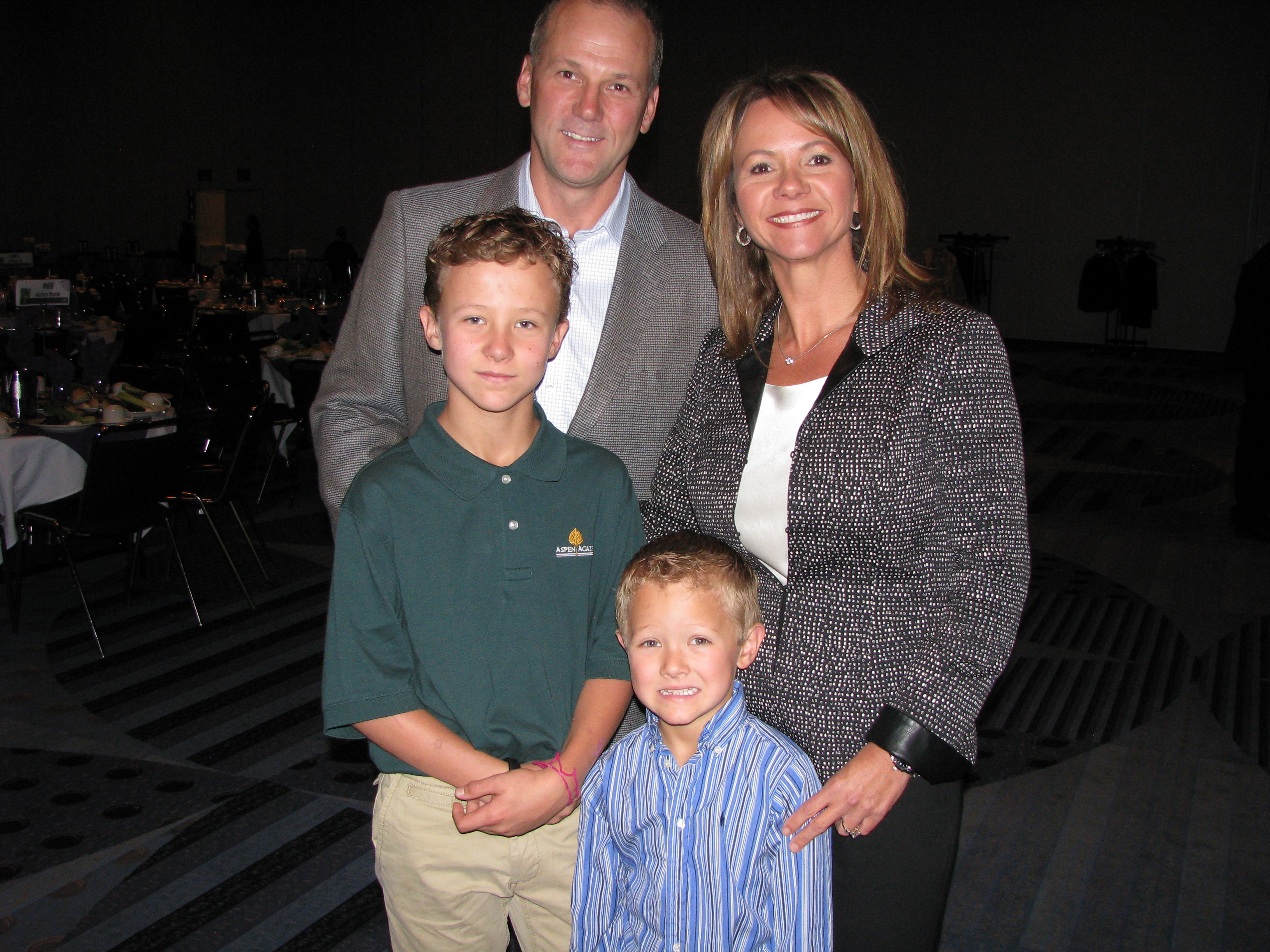 Rob and Jodi Rolland celebrate the forum with their sons Keaton and Connor