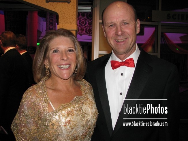 Susan McIntire smiles with Trustee Peter Dea