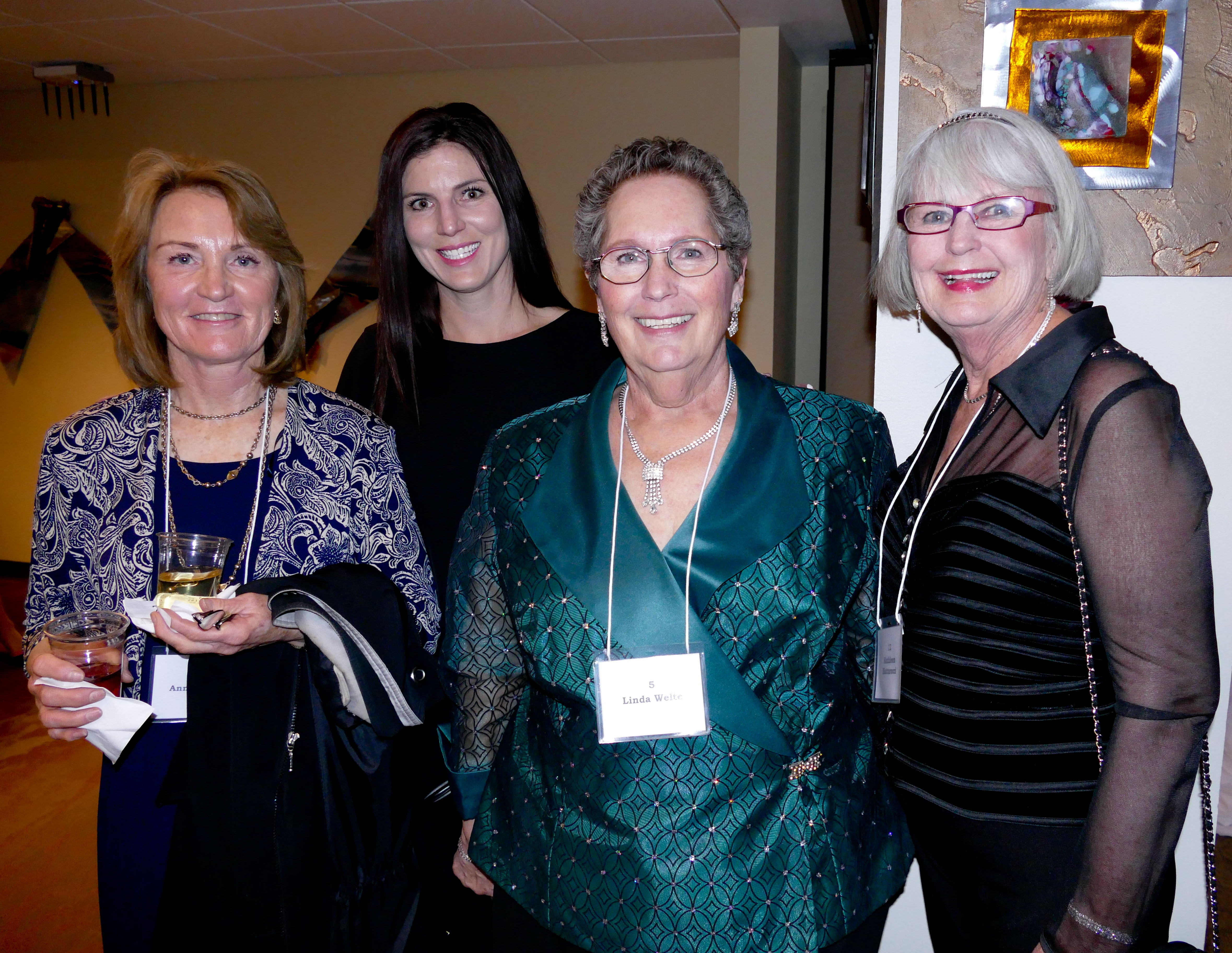 Anne Henne (sister of inductees Joe and Tom Welte), left, Maggie Welte ...