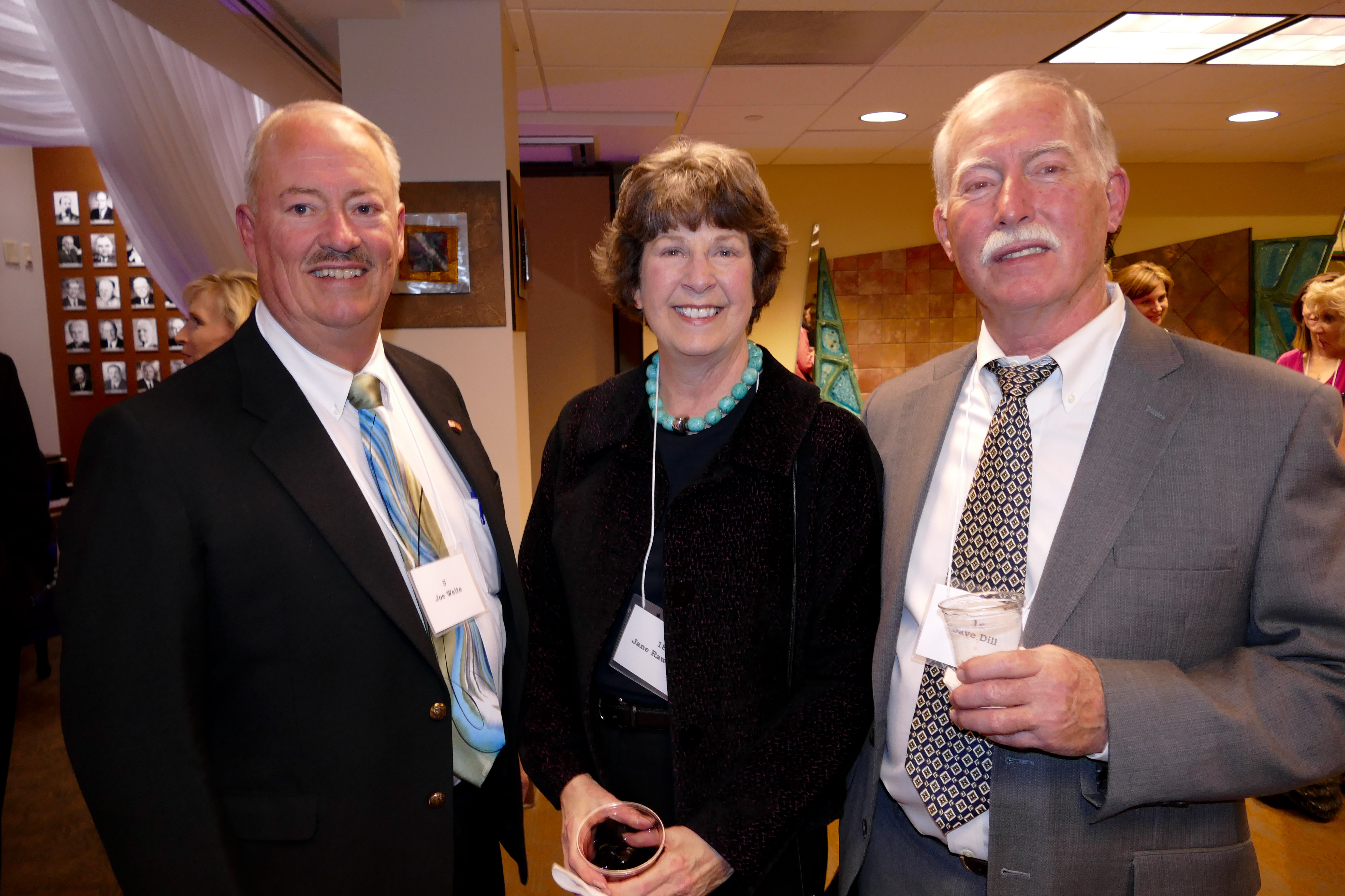 Joe Welte, left, Jane Rawlings and her husband Dave Dill
