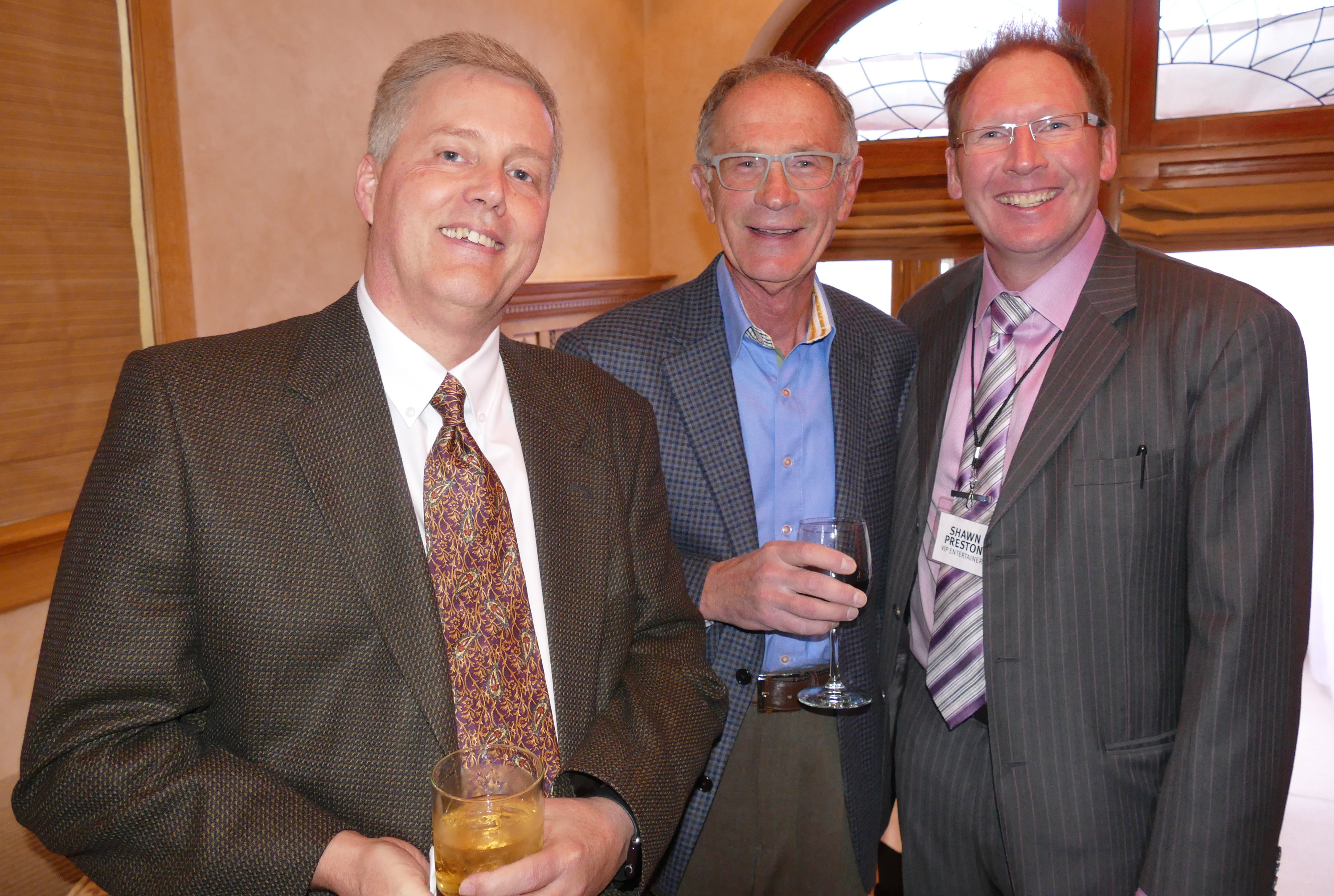 Brian Day, left, Eric Hoover, Shawn Preston (magician)