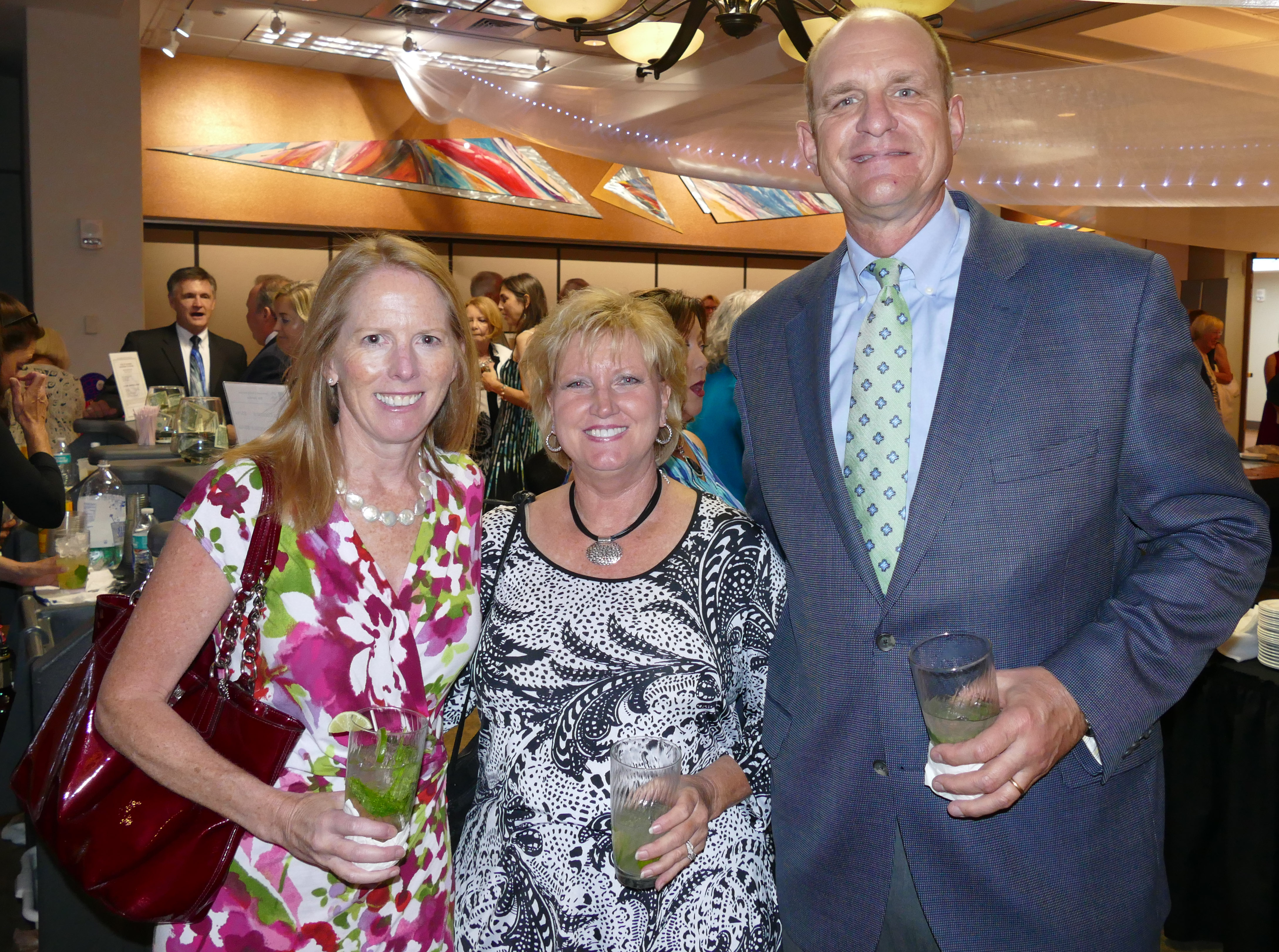 Katie Kellen, left, Sue and Scott Bacon