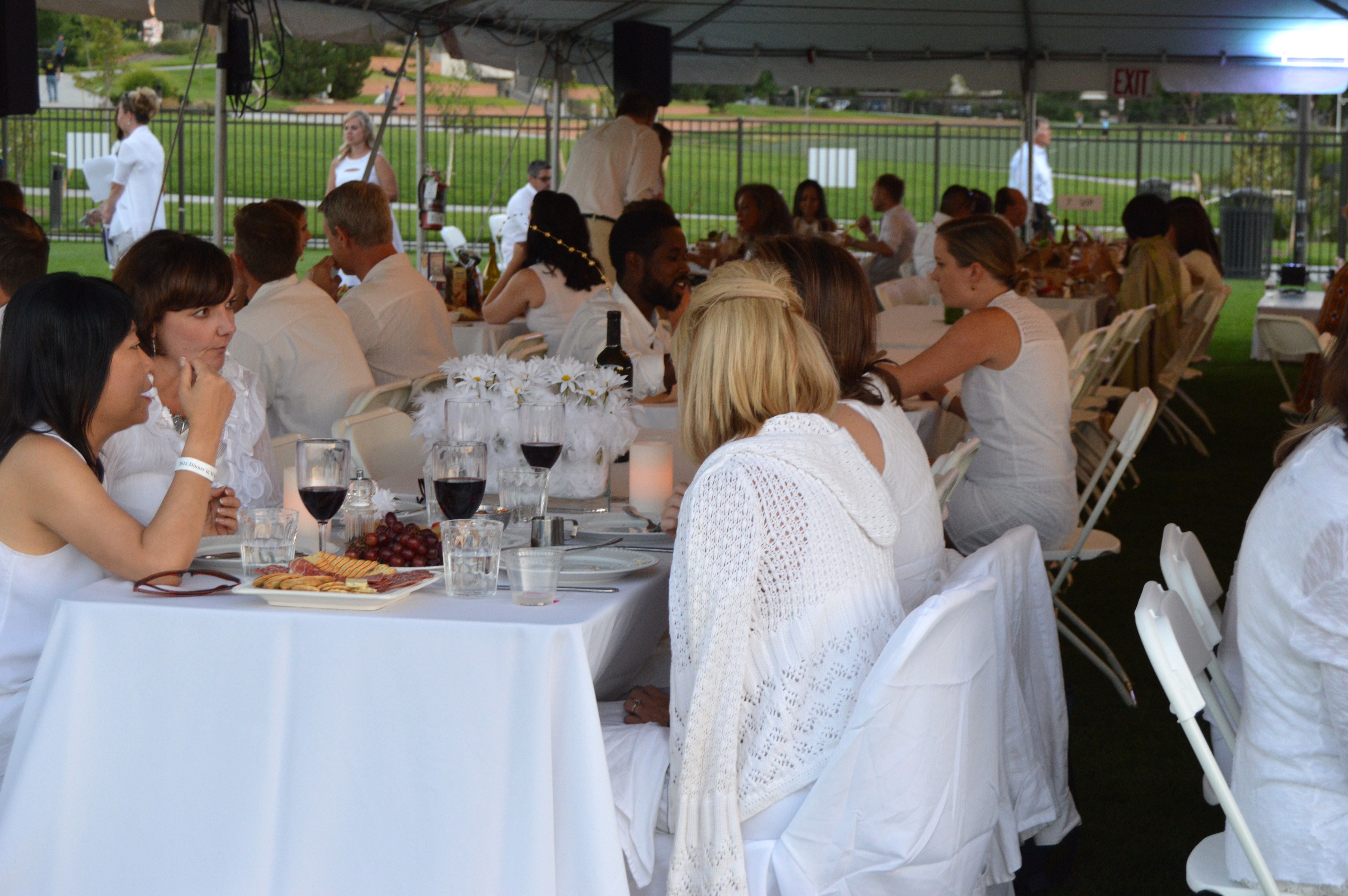 Settling in for dinner in white, of course.