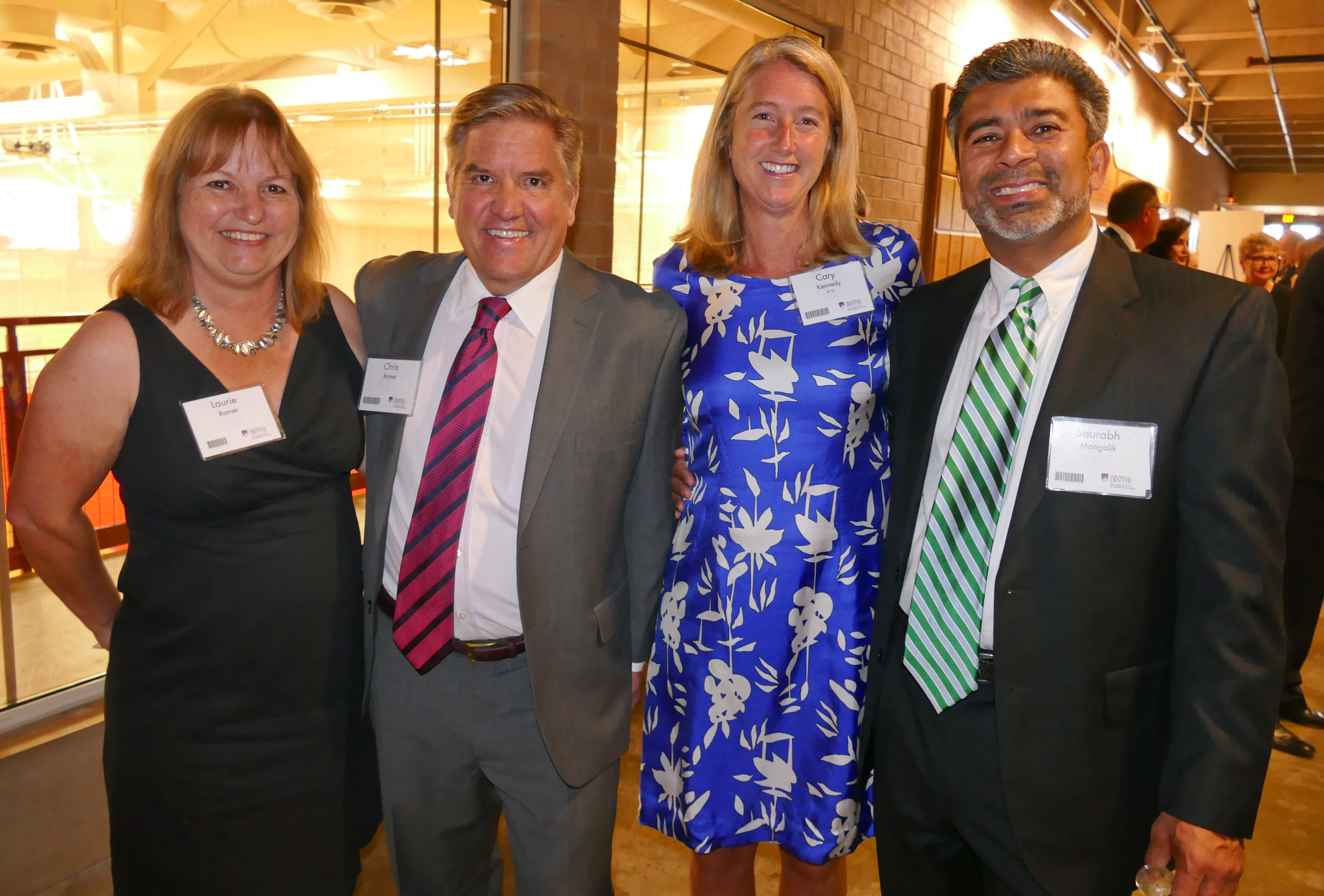 Laurie and Chris Romer, left, Cary Kennedy, Saurabh Mangalik