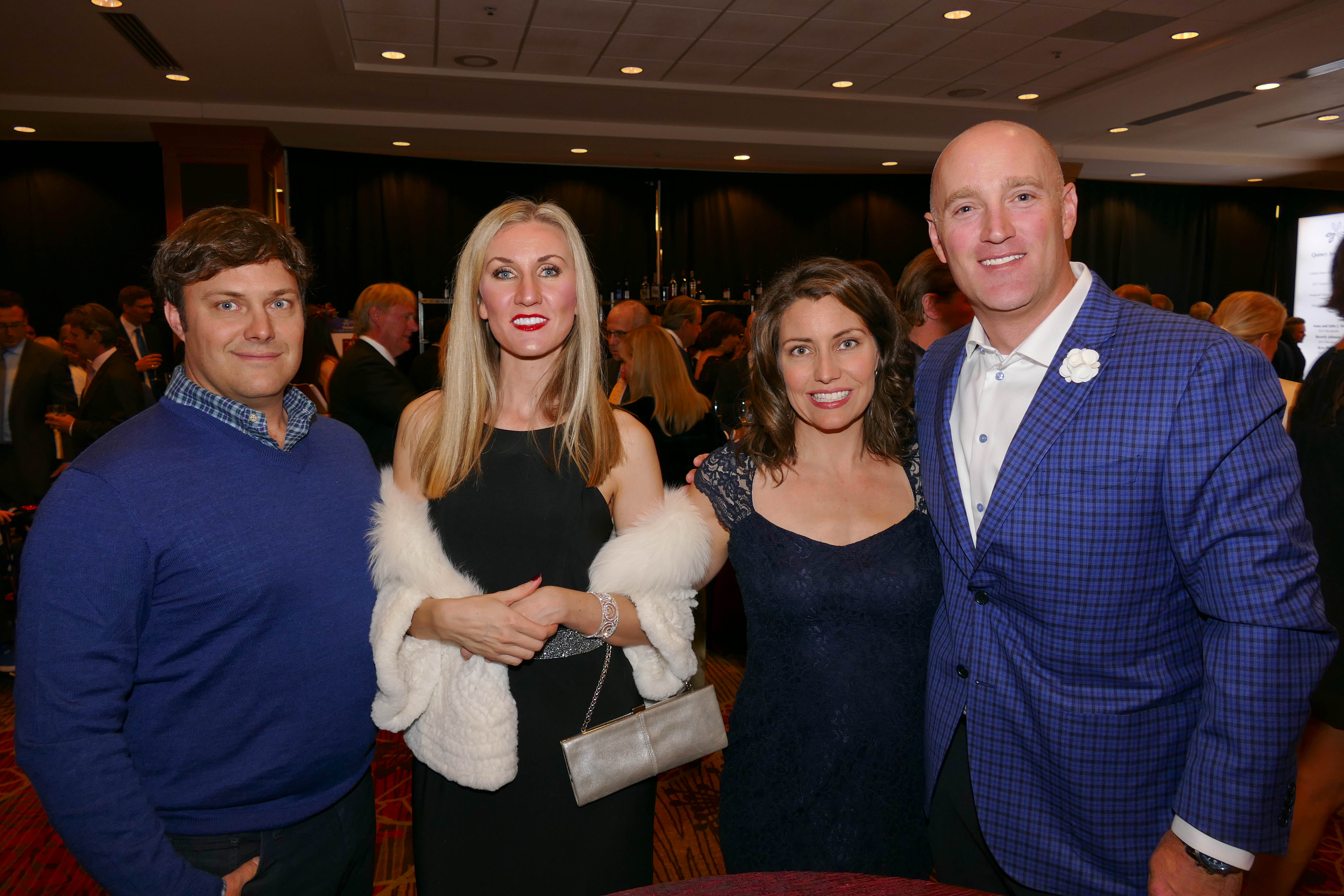 John and Irina Grohne, left, with Sydney and TJ Green