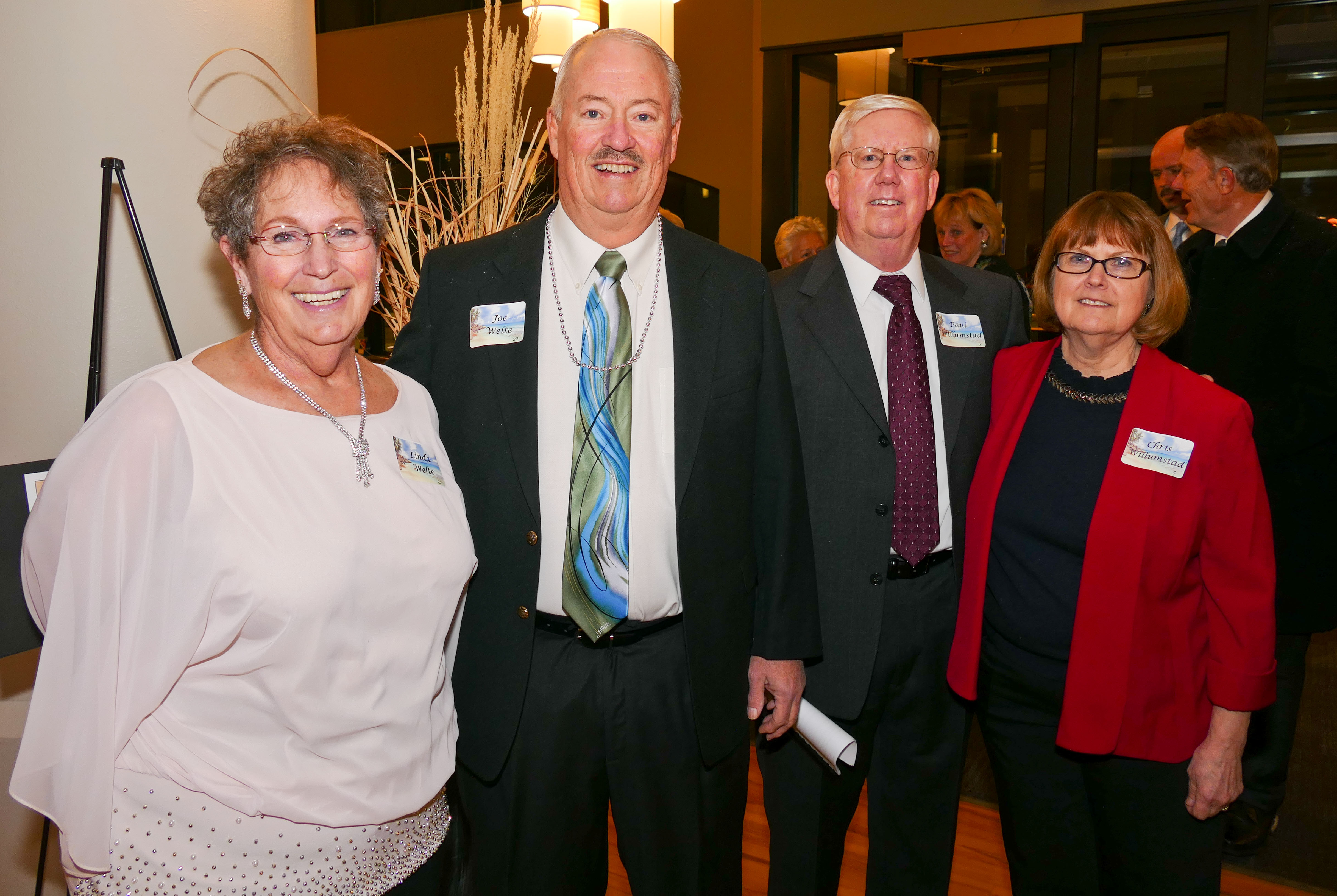 Linda and Joe Welte (PCC HOF '16), left, Paul and Chris Willumstad