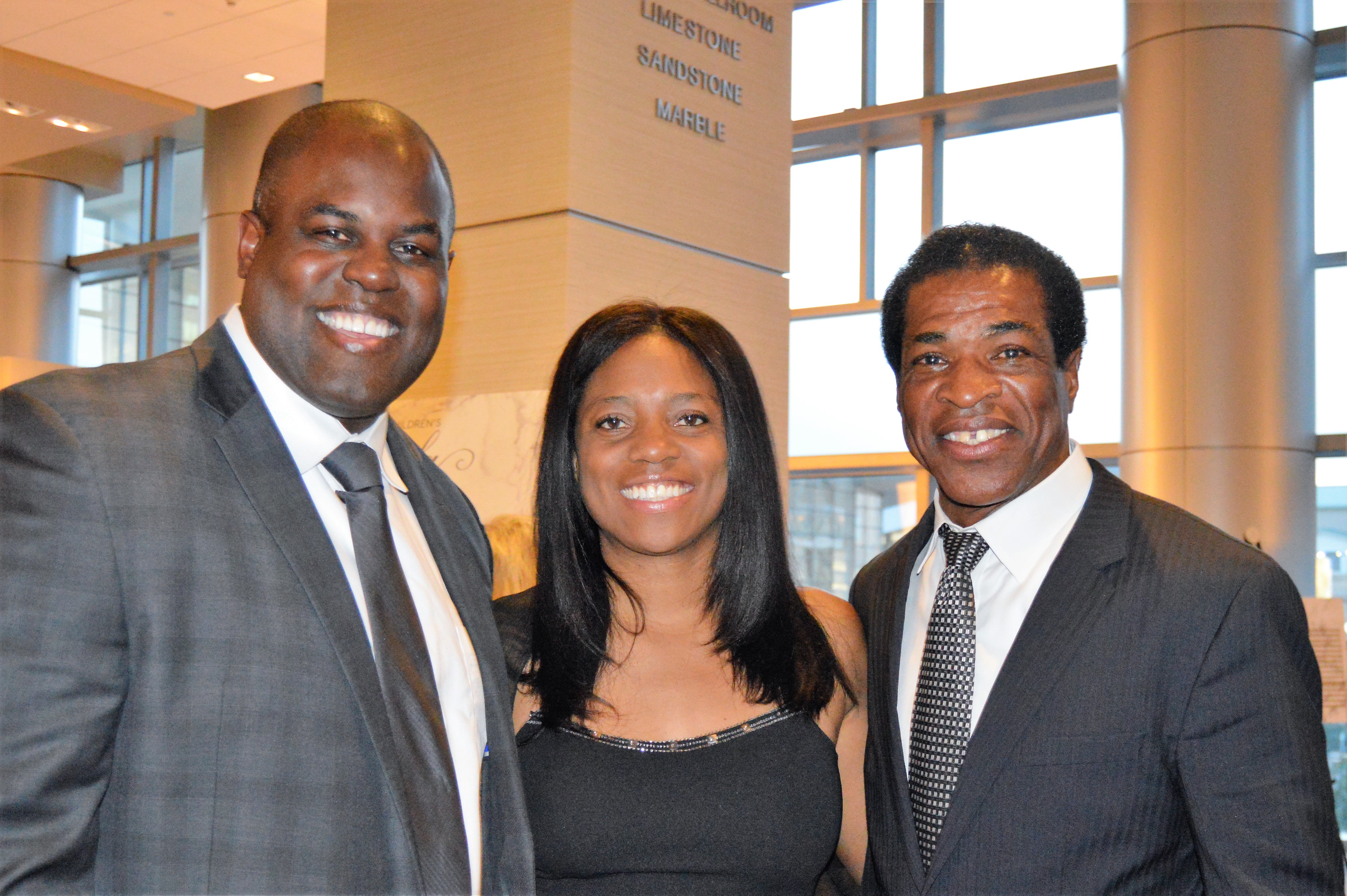 Event emcee and former Bronco Reggie and Stephanie Rivers, with