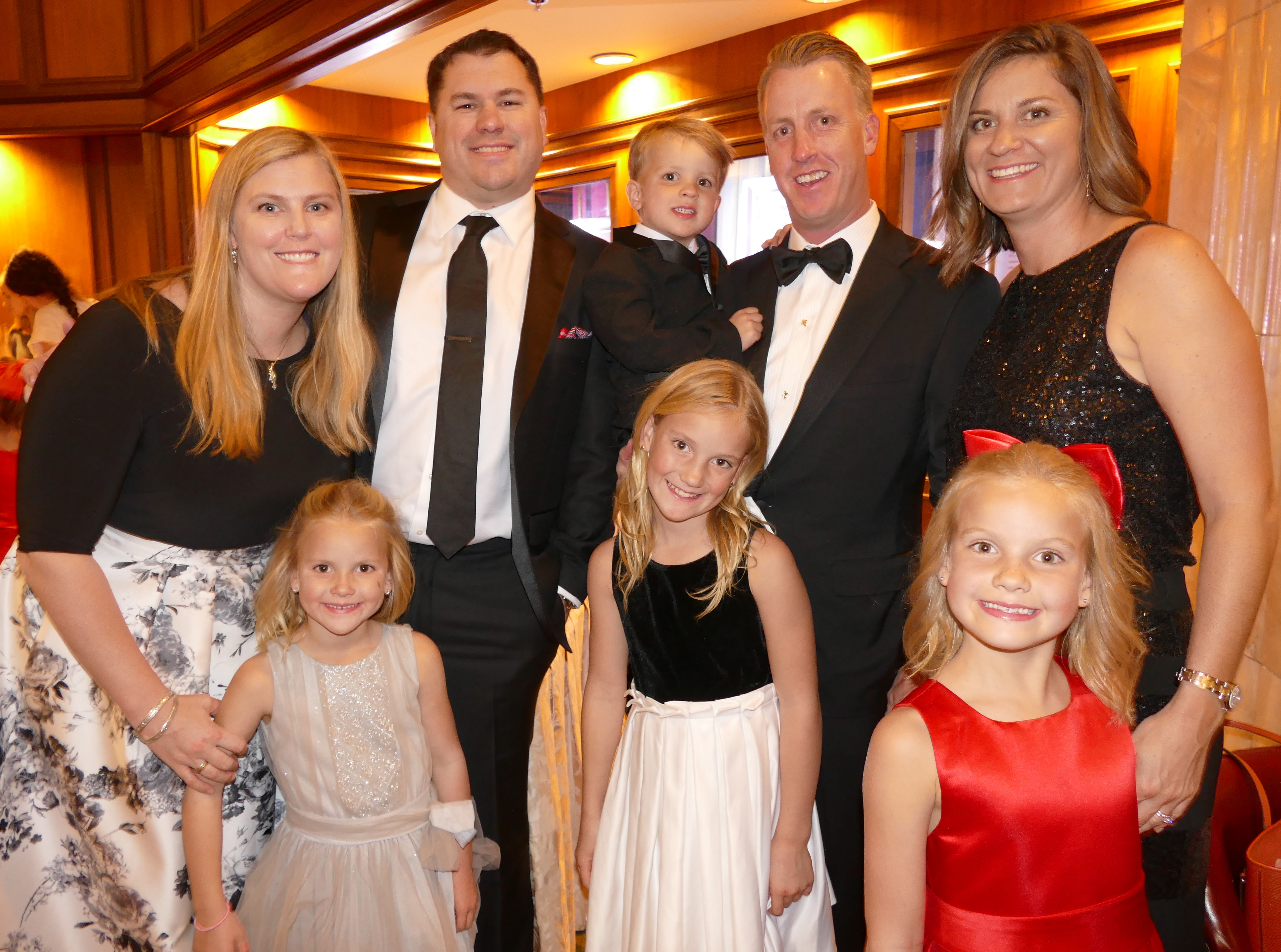 Christina and Rich Walker, left, John Freyer Jr and Andi (he's holding