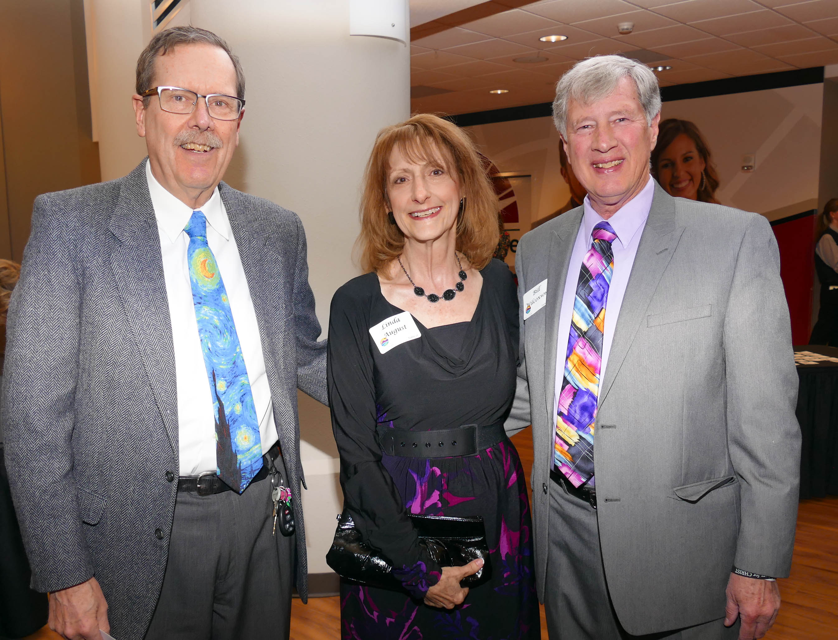 Joe Klune, left, with Linda August and Bill Wilcoxson