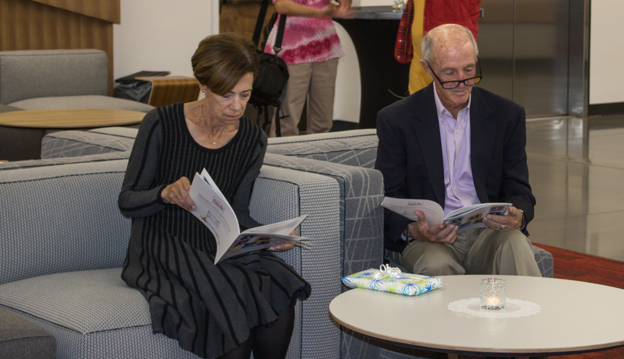 While waiting for the event to start guests browsed through the program