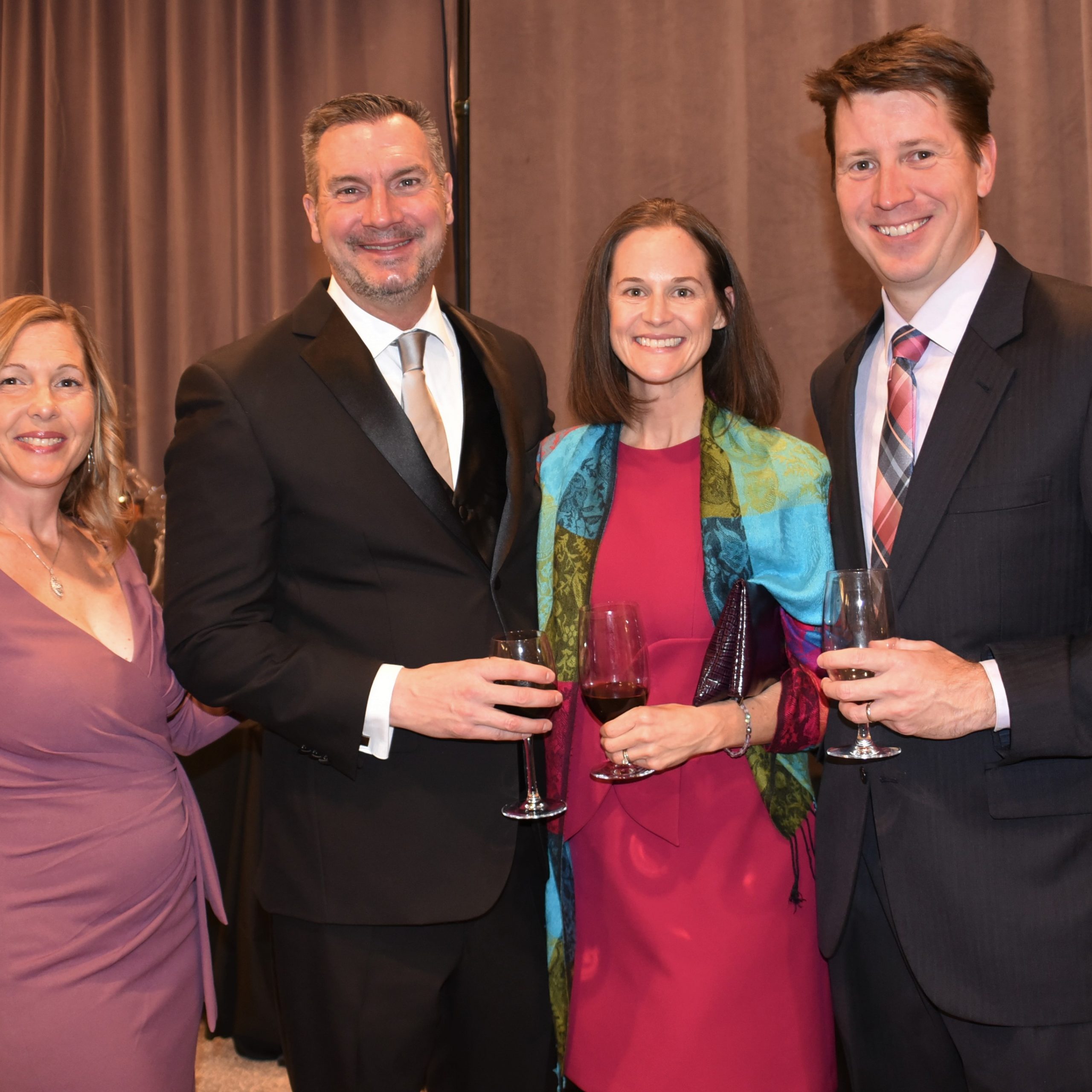 Tricia and Scott Arthur, left, with Katy and Mike Kotlarczyk